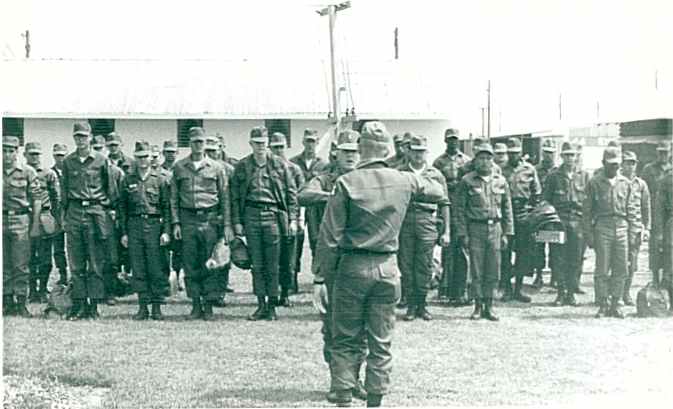 697th Formation between Orderly Room & Mess Hall

in July 1968 at Camp #44, Korat, Thailand